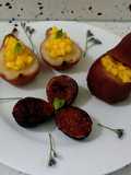 Peras confitadas en Rioja rellenas de mango e higos asados