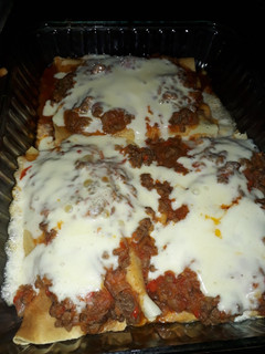 Una foto de CANELONES de ACELGA con SALSA BOLOÑESA