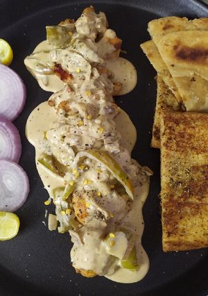 A picture of Grilled Chicken In White Pepper Sauce.