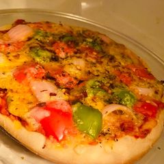 A picture of Pizza with readymade Pizzabase.
