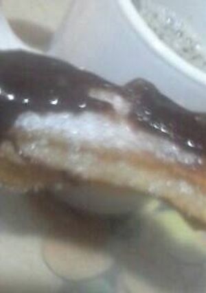 Una foto de Churros cubiertos de chocolate😋