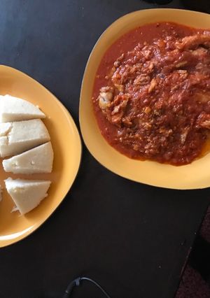 A picture of Marinated Stewed Fish and Ugali.