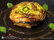 Una foto di zucchine panna parmigiano