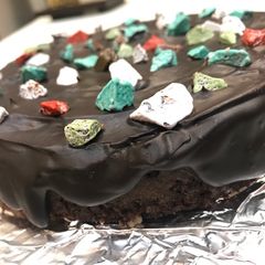 A picture of Chocolate ganache cake with chocolate stones#chocolate.