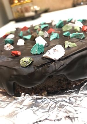 A picture of Chocolate ganache cake with chocolate stones#chocolate.