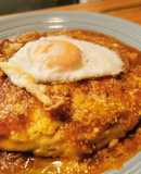 Polenta con tuco de pollo y huevo frito