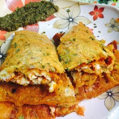A picture of Besan egg Paneer stuffed Chilla.