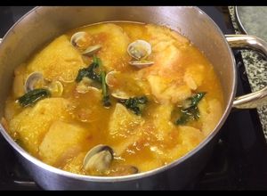 Foto principal de Sopa de tomates con almejas