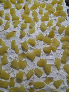 Una foto de Pastel de 3 leches de piña y coco