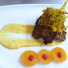 A picture of Pan Fried Fish with Maltaise Sauce.