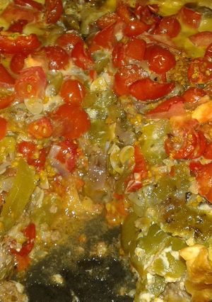 Una foto de Tarta de carne, zapallitos y tomate