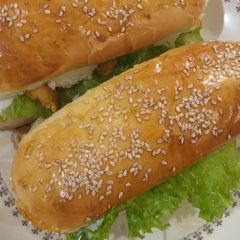 A picture of Chicken tikka subway burger with homemade sub burger.