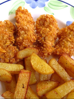 Corn flakes bundában sült csirkecomb (Gluténmentesen is) recept fotója