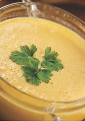 Una foto de Puré de arroz y pollo para bebés