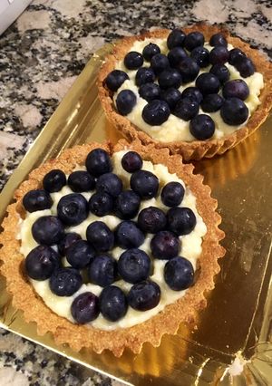 Una foto de Tarta de Arándanos y crema pastelera 🤩