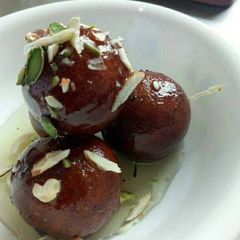 A picture of Indian name gulab jamun persian name luqmat al qadi.