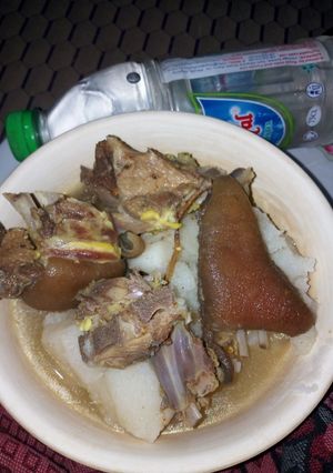 A picture of Boiled Yam with Goat Meat Peppersoup.