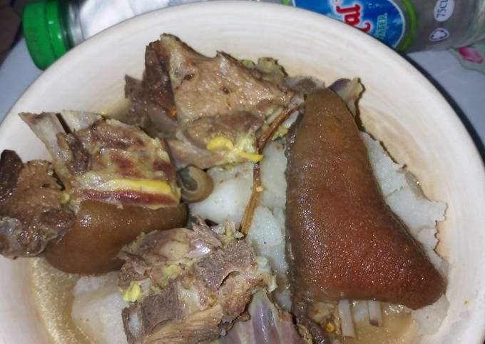 Boiled Yam with Goat Meat Peppersoup