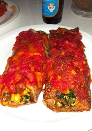 Una foto de Canelones de espinaca y pollo