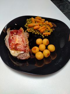 Une photo de Spiringue de porc gratiné au brie et jambon de parme