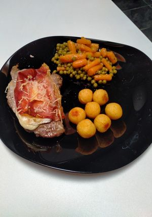 Une photo de Spiringue de porc gratiné au brie et jambon de parme