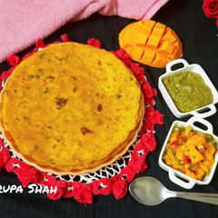 A picture of Mango theplas with mango salsa.