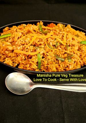 A picture of Veg Schezwan Fried Matta Red Rice.