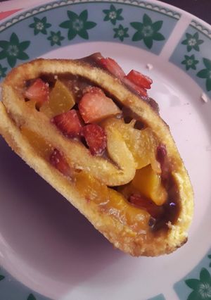 Una foto de Pionono relleno