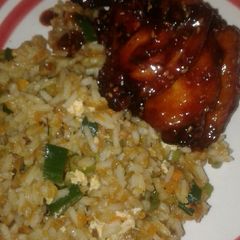 Honey soy chicken wings and fried rice A picture of Honey soy chicken wings and fried rice.