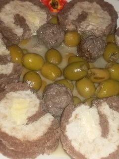 صورة لوصفة دولمة زيتون برولي اللحم و الدجاج
