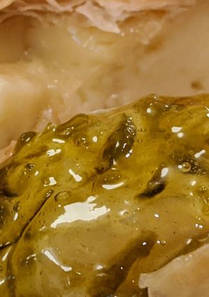 A picture of Jalapeno Jelly on Baked Brie.