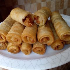 A picture of Sea food spring rolls.