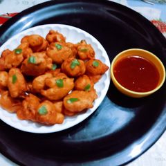 A picture of Tasty yummy moong daal pakoda.