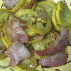A picture of Squash with bacon.