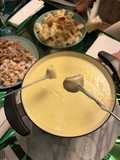 Fondue de quesos con cerdo y pollo a taquitos