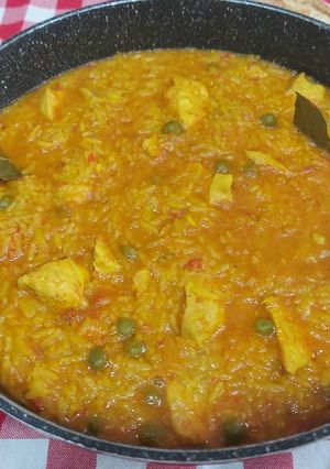 Una foto de Arroz caldoso con pollo