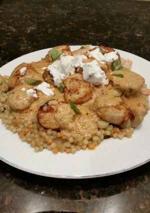 A picture of Brad's curried scallops with black truffle goat's cheese.