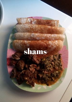 A picture of Rice pancake (Sinasir) wit vegetable soup and pepper soup.