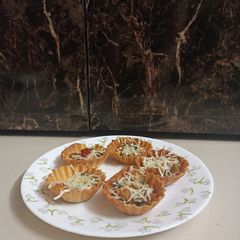A picture of Pizza canapes.