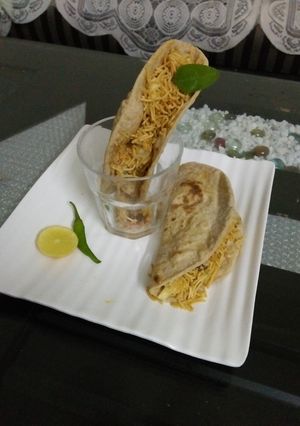A picture of Whole wheat Tacos with leftover chana vegetable.