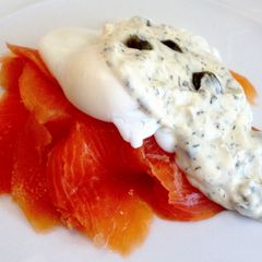 A picture of Smoked Salmon and Poached Eggs with Dill and Caper Sauce.