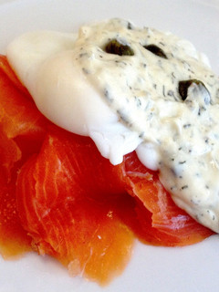 A picture of Smoked Salmon and Poached Eggs with Dill and Caper Sauce.