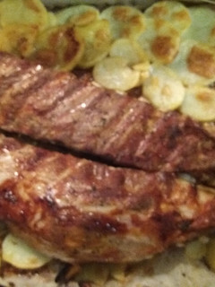 Una foto de Costillas al horno estilo barbacoa