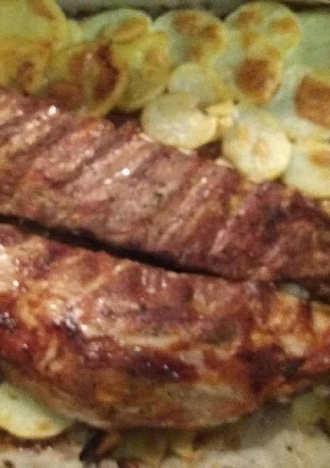 Una foto de Costillas al horno estilo barbacoa