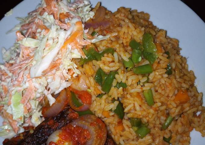 Jollof Rice/peppered Goat meat /Cole slaw