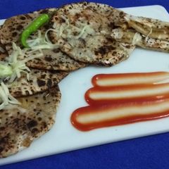 Stuffed Aloo Kulcha On Tava A picture of Stuffed Aloo Kulcha On Tava.