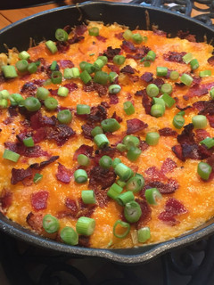 A picture of Cast Iron Skillet Loads Mashed Potato.