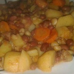 A picture of Githeri mixed with carrots and potatoes.