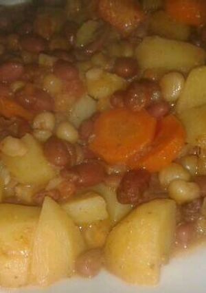 A picture of Githeri mixed with carrots and potatoes.