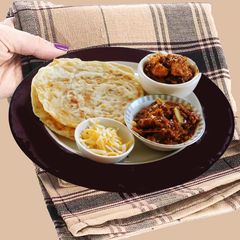 A picture of Cheesy Multi Layered Flat bread.